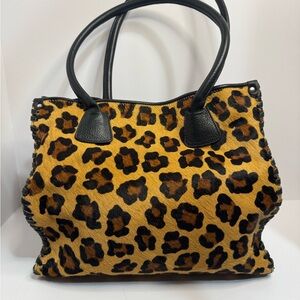 Claudia Firenze genuine leather made in Italy calf hair bag. So stylish